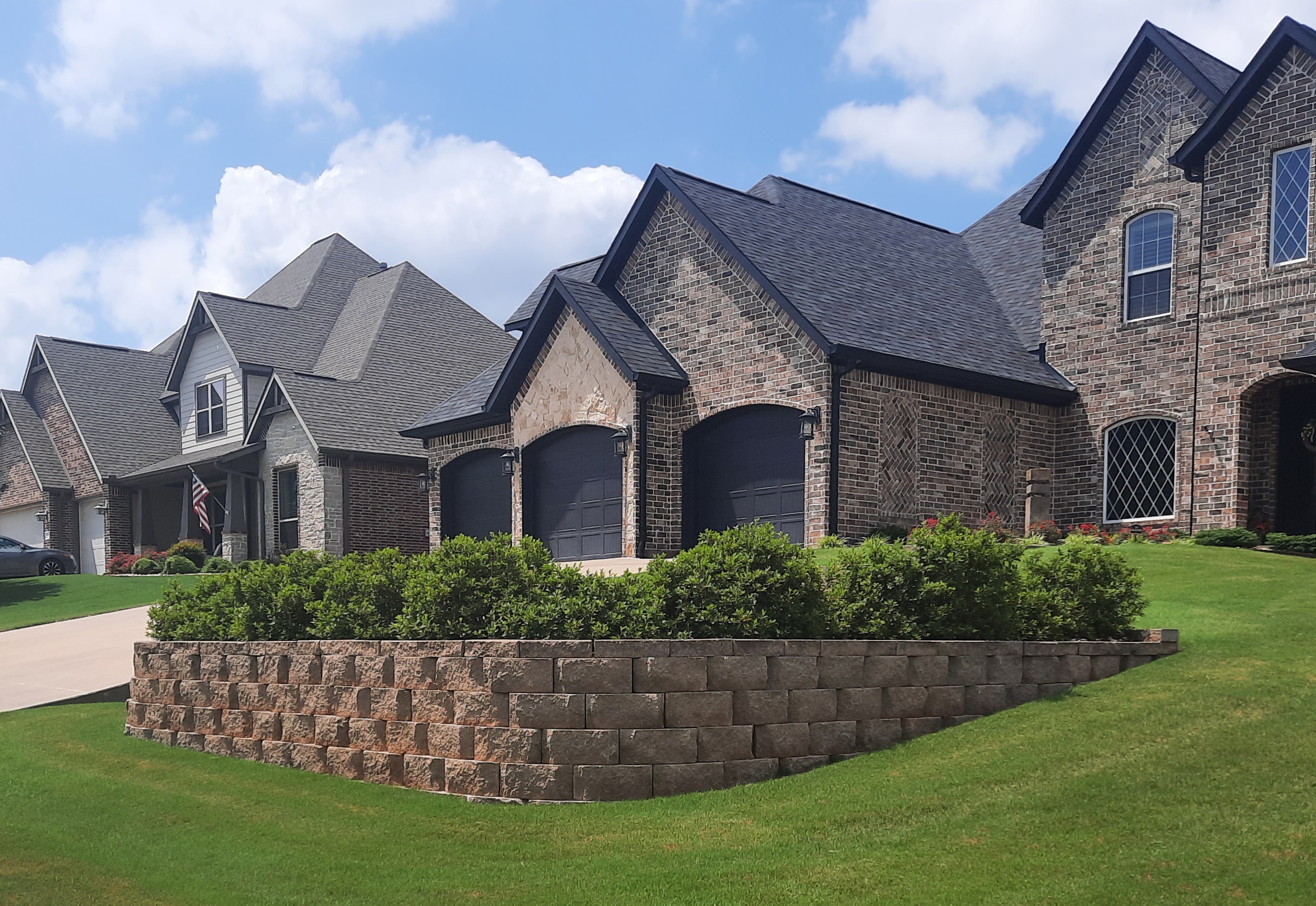 Why NWA Homeowners Deal With Drainage and Grading Problems Every Spring (And What Actually Fixes Them)